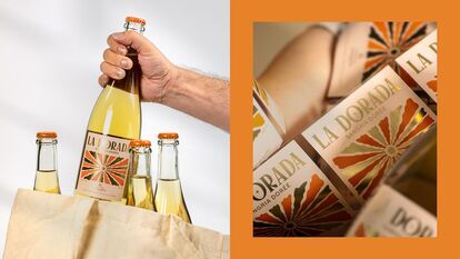 Main tenant une bouteille de sangria La Dorada du Domaine Lafrance dans un sac en tissu beige, autres bouteilles visibles, gros plan sur étiquette colorée orange et dorée avec motif rayonnant, fond blanc et orange.